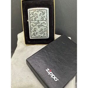 Zippo Lighter In Box Scrolling With Papers Shows Signs the Flint‎ Was Tested